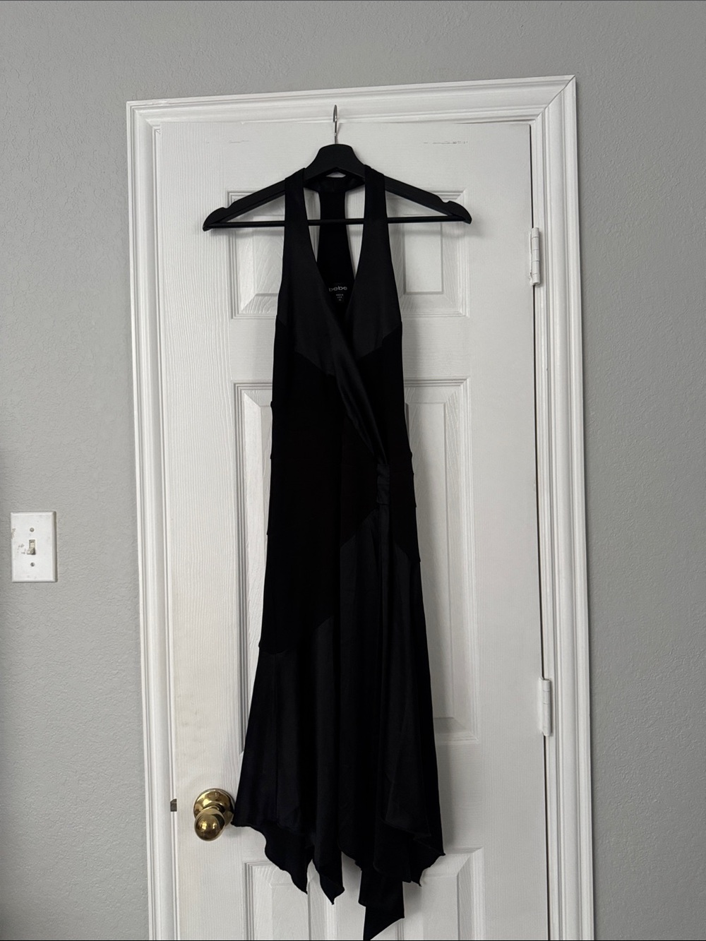 bebe black asymmetrical halter to racer back dress